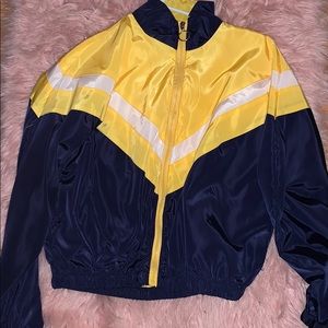 Yellow and navy university style windbreaker